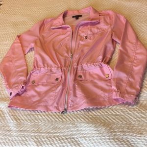 Pink Ralph Lauren windbreaker.
